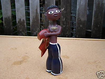 VINTAGE GOLLIWOG HEAVY SOLID WOOD U2 OR US SCULPTURE  